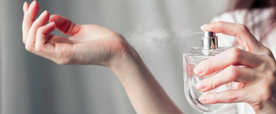 spraying perfume